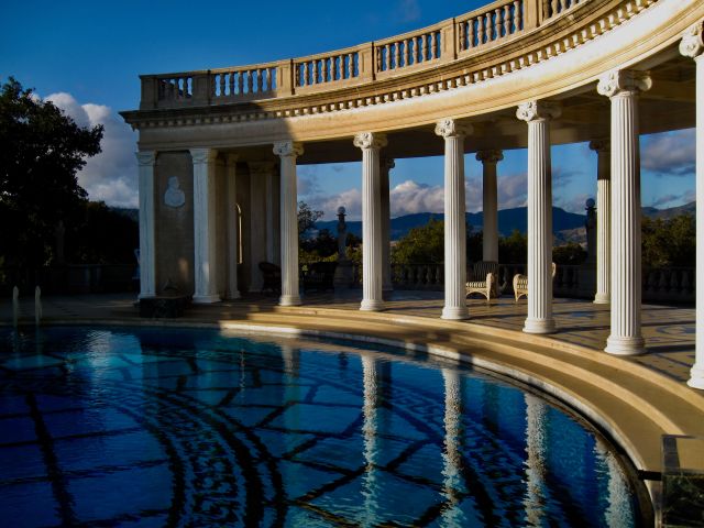 Hearst Castle With A Large Pool Of Water